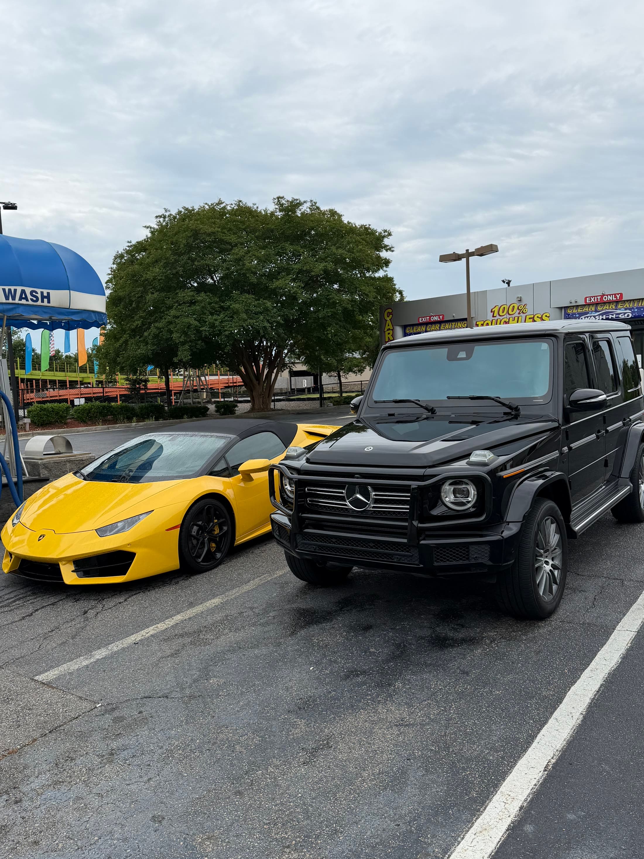 Vehicles at a 100% touch-free wash running Carolina Shine equipment